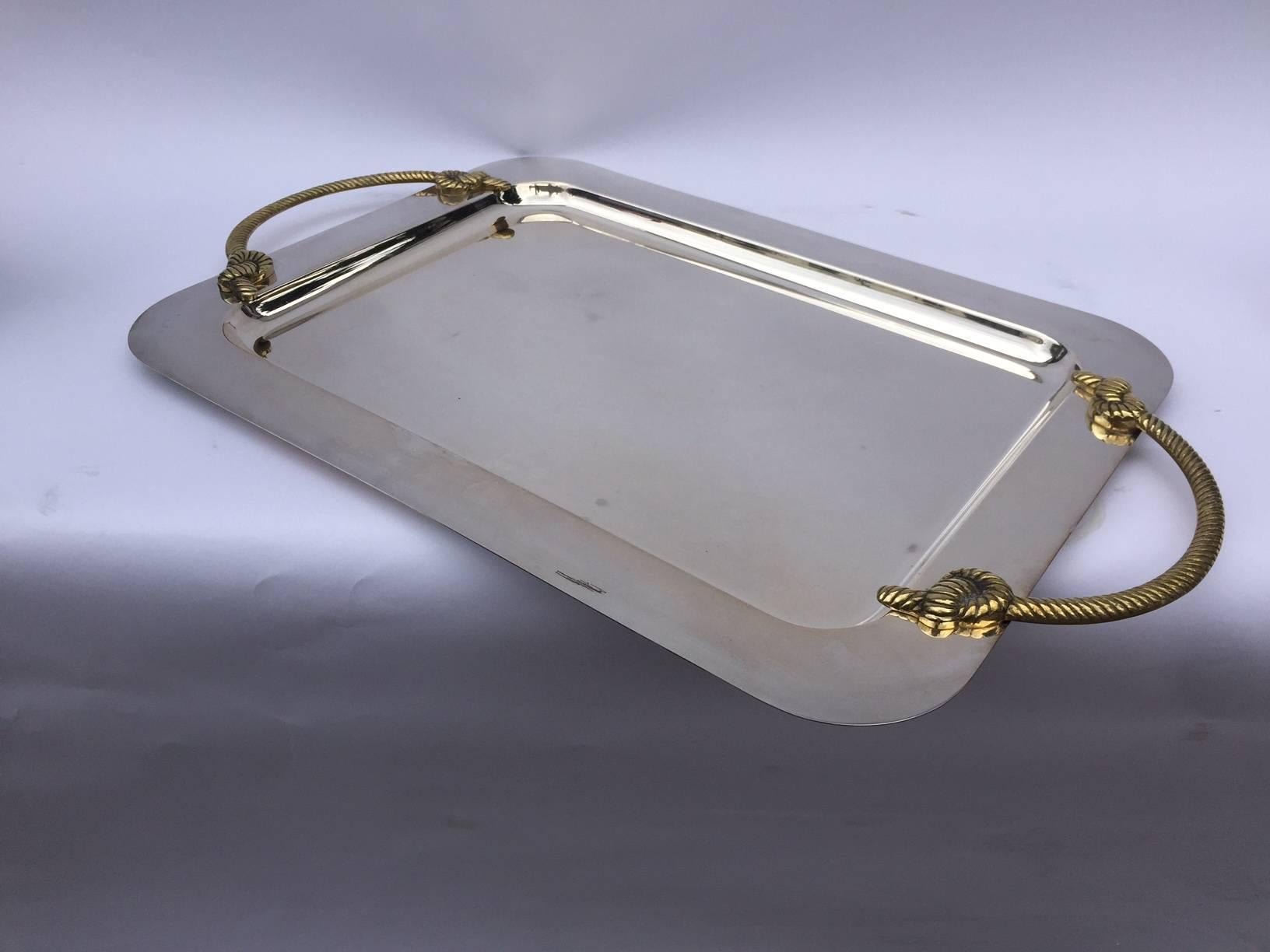 Chrome-plated tray with attached decorative brass handles in the shape of the rope, in the style of L.Sabattini, circa 1960s, Italian.