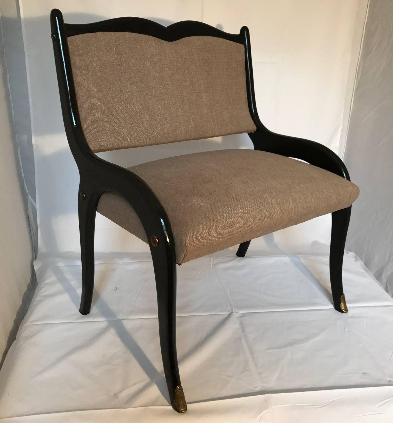 This 1950s Italian bench been reupholstered in linen and ebonized frame, front feet have brass sabot, perfect for children's room.