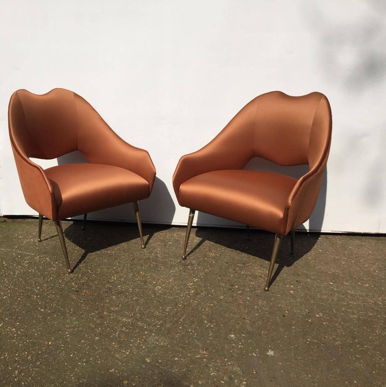 A pair of 1950s Italian side chairs reupholstered in satin at the front and velvet at the back on the brass feet.