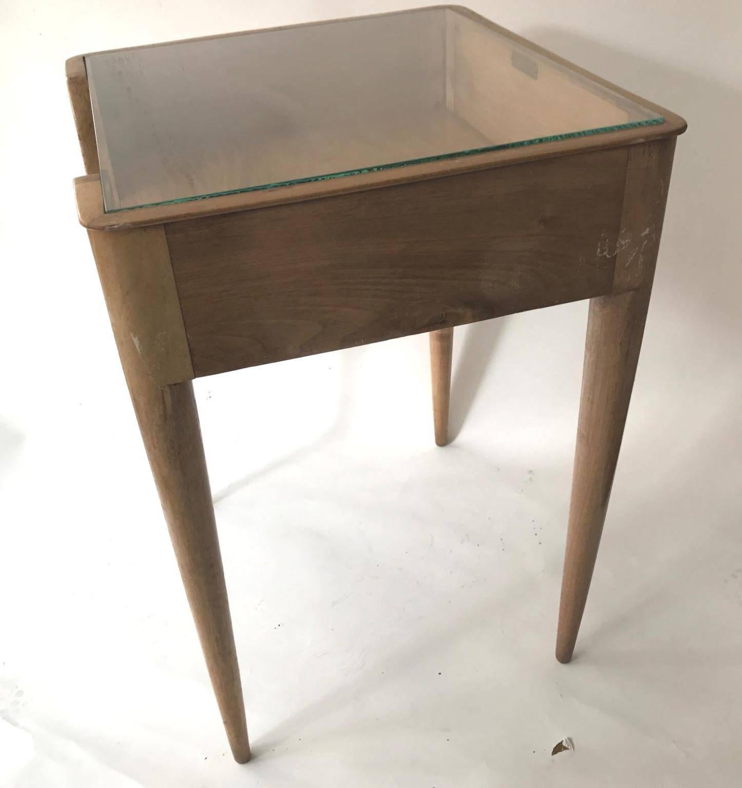 A pair of Italian circa 1937 side tables in bleached walnut and the glass top, from hotel Mediterranio. Label from Fratteli Strada, attributed to Gio Ponti.