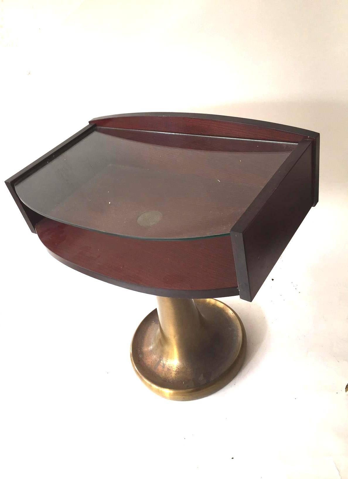 A pair of 1970s side tables in mahogany and glass top, on round brass base,
Italy, Milan labelled 