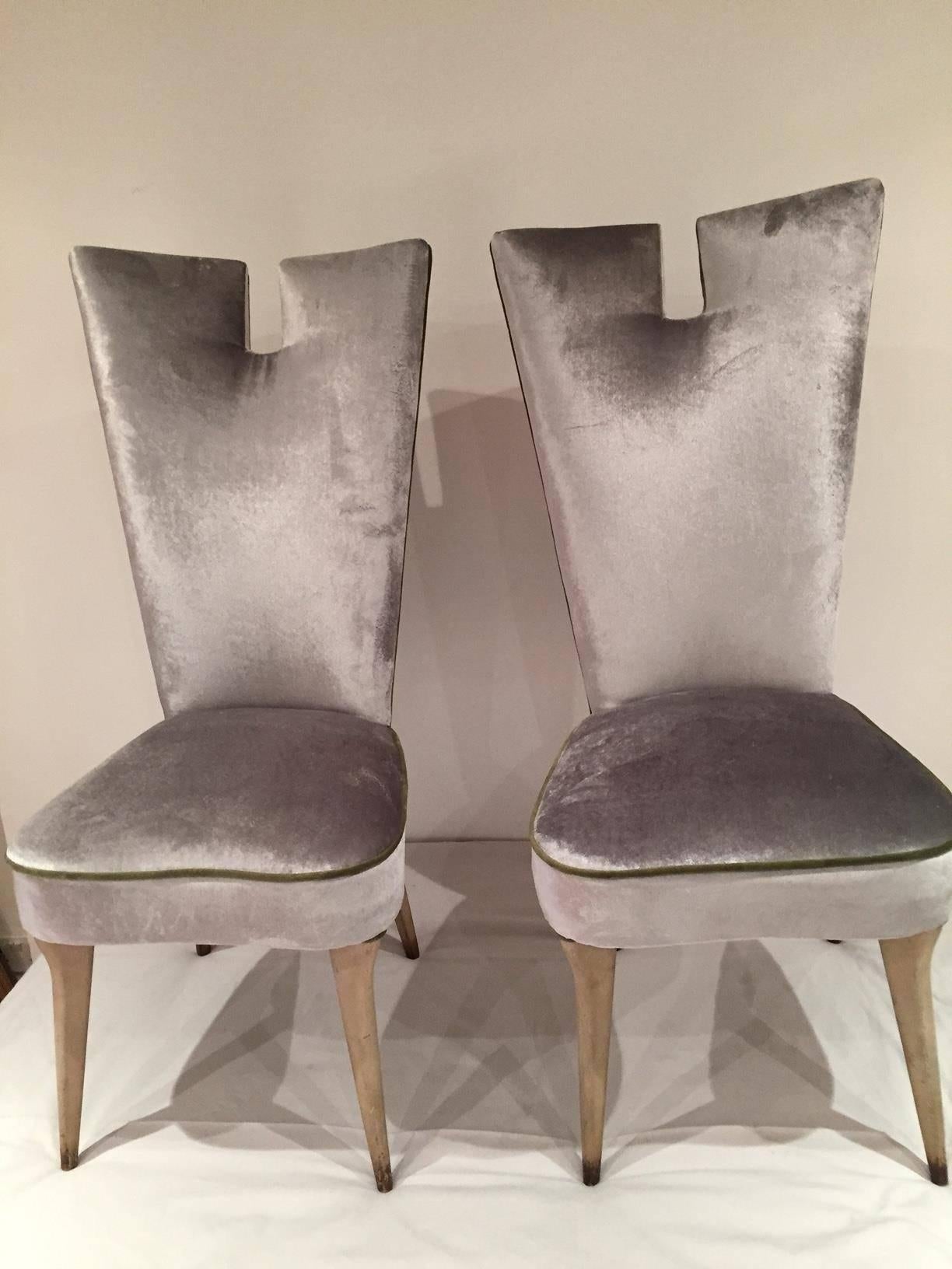 A pair of height back chairs on the bleach wooden feet, and reupholstered in silver velvet. Italian, 1940s.