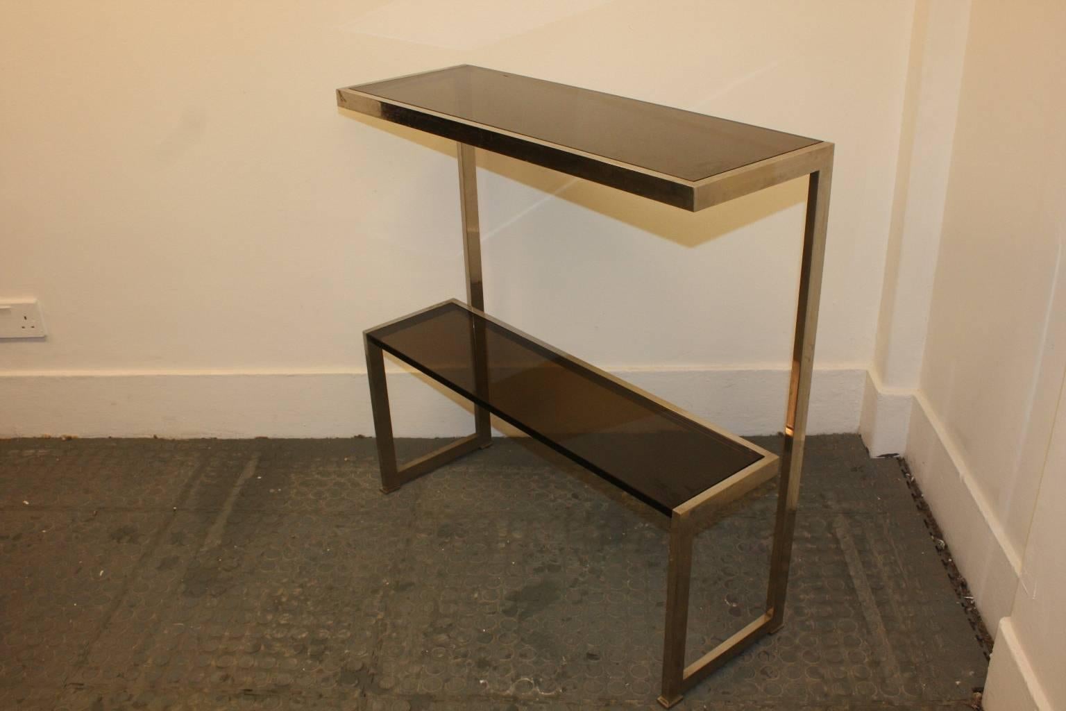Two tiers chrome and smoked glass small console-table.Italian 1970s