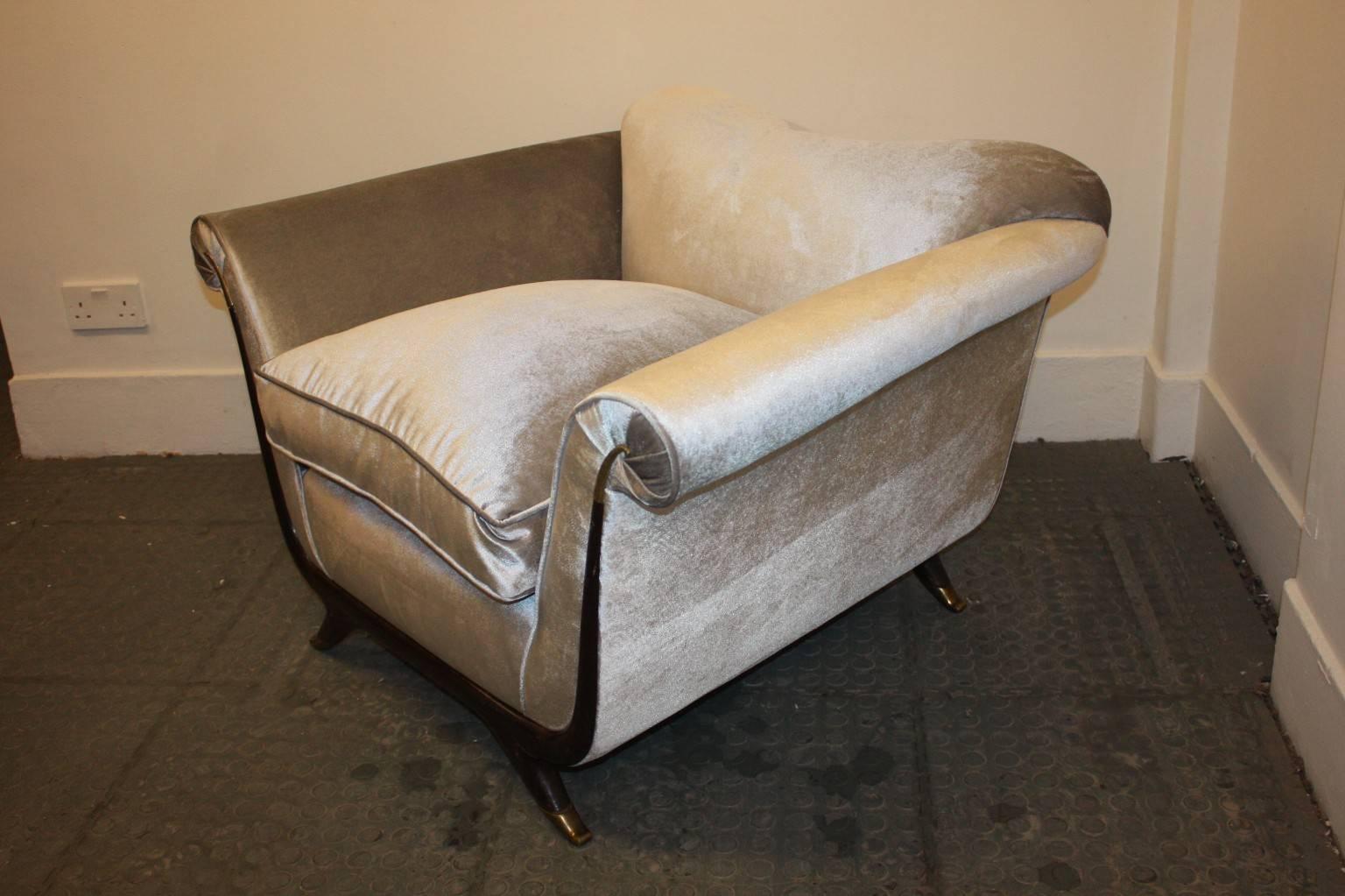 A pair of stunning armchairs with new upholstery in gray velvet, with brass sabot on the feet and decorative brass finish on the arms. Designed by G. Ulrich, Italian, 1940s.