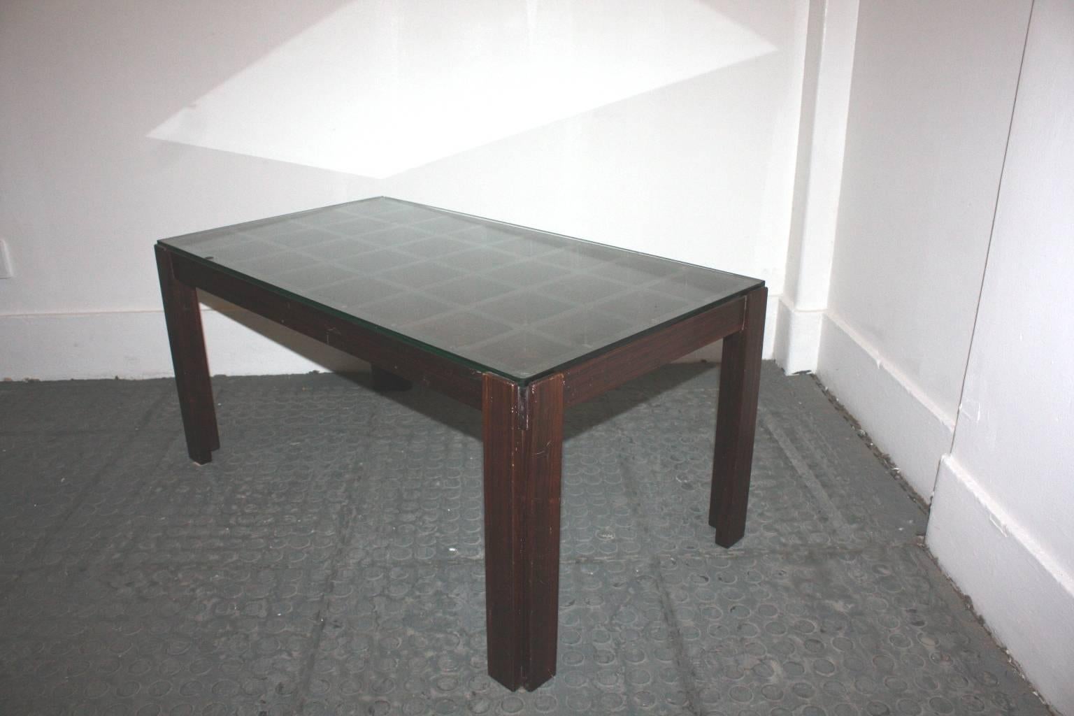 1940s Italian coffee table with  square holes and glass top.