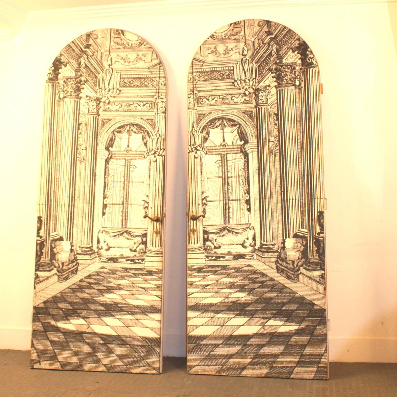 A pair of beautiful large doors with a printed scenery of grand room, back of the doors in plain creamy color, in style Piero Fornasetti, 1950s, Italian.