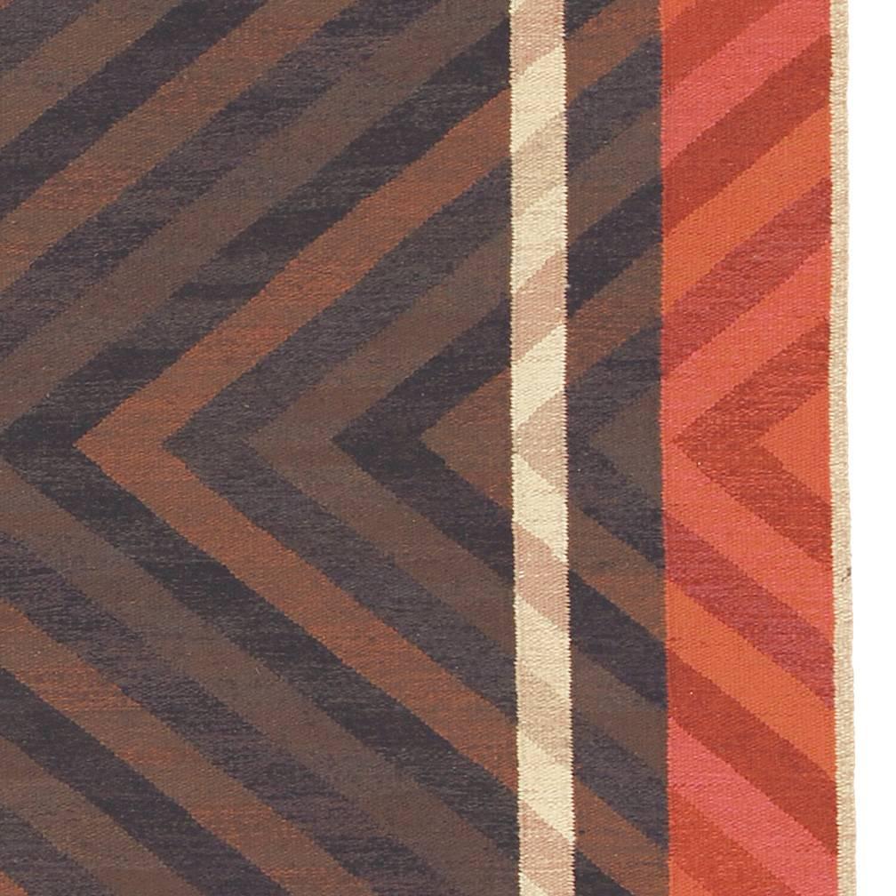 Mid-20th century Swedish flat-weave carpet. 
Initialed 'ID KLH' (Ingrid Dessau, Kristianstad Läns Hemslöjd).