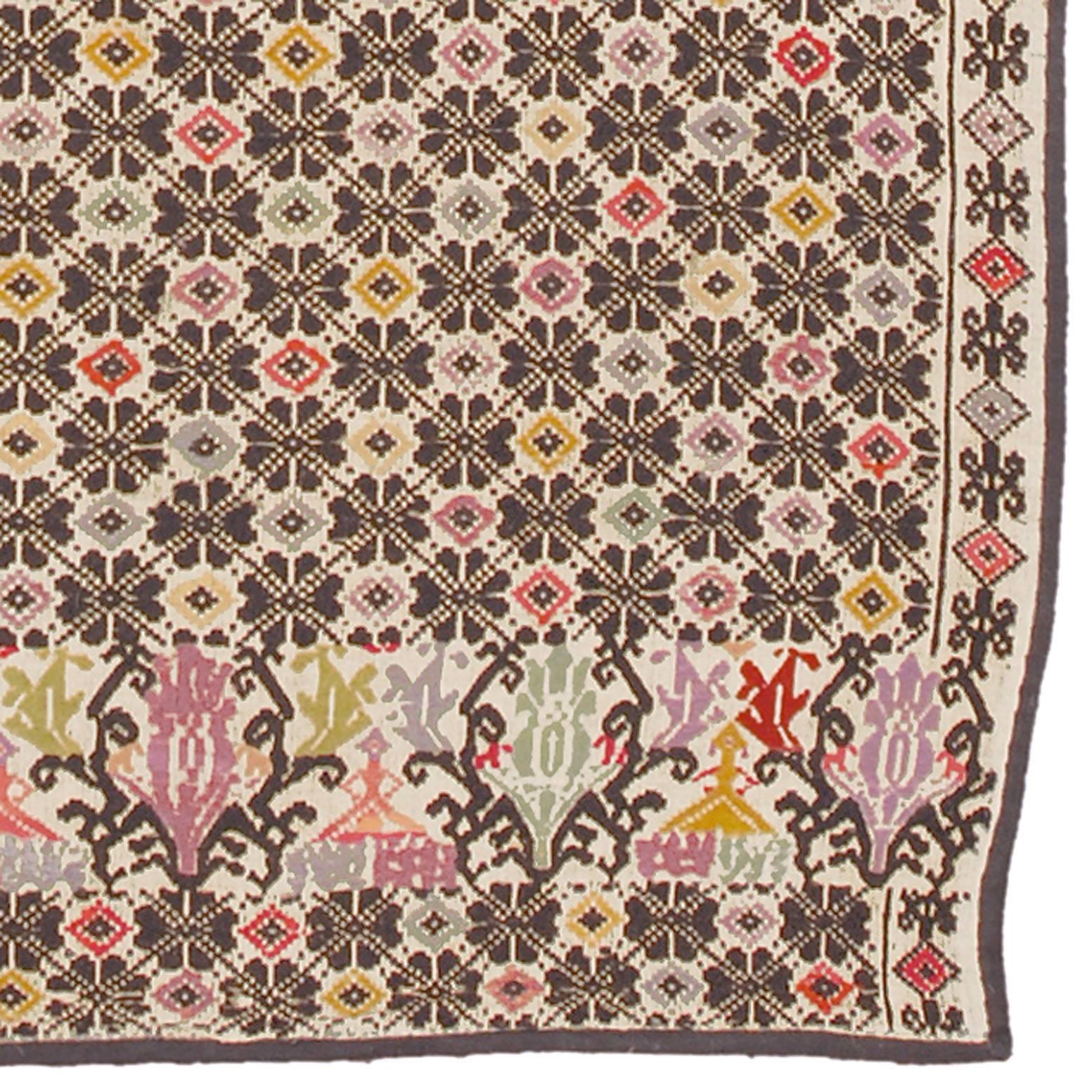 Late 19th century needlepoint carpet.