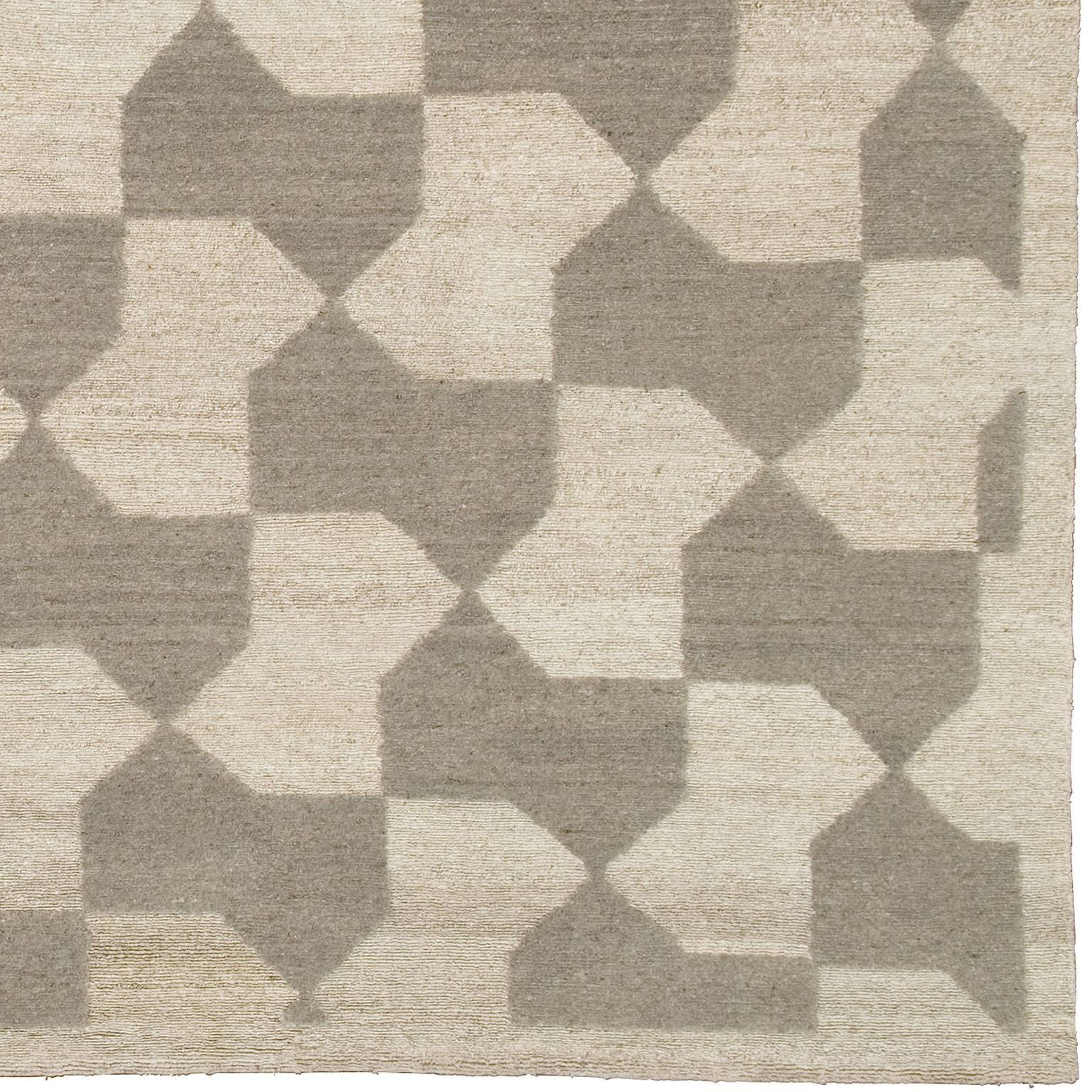Tapis contemporain en forme de nœud papillon
Deux niveaux, pile coupée et boucle. Laine Salu (poils coupés) + Ortie (boucle).
