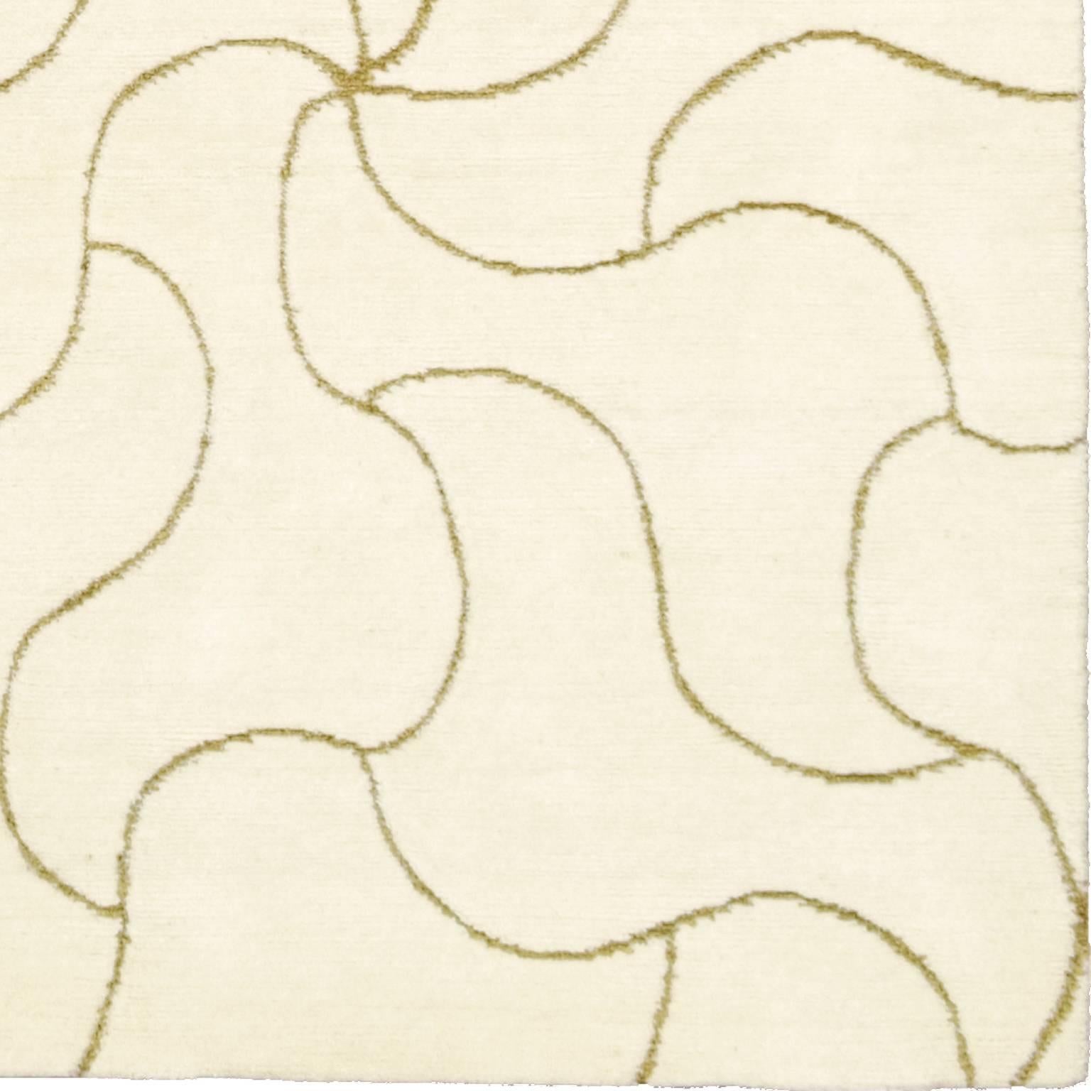 Tappeto 'Fiore' Contemporary
Due livelli, pile tagliato e bordo ad anello: 
Lana neozelandese sbiancata (vello) e ortica (anello).