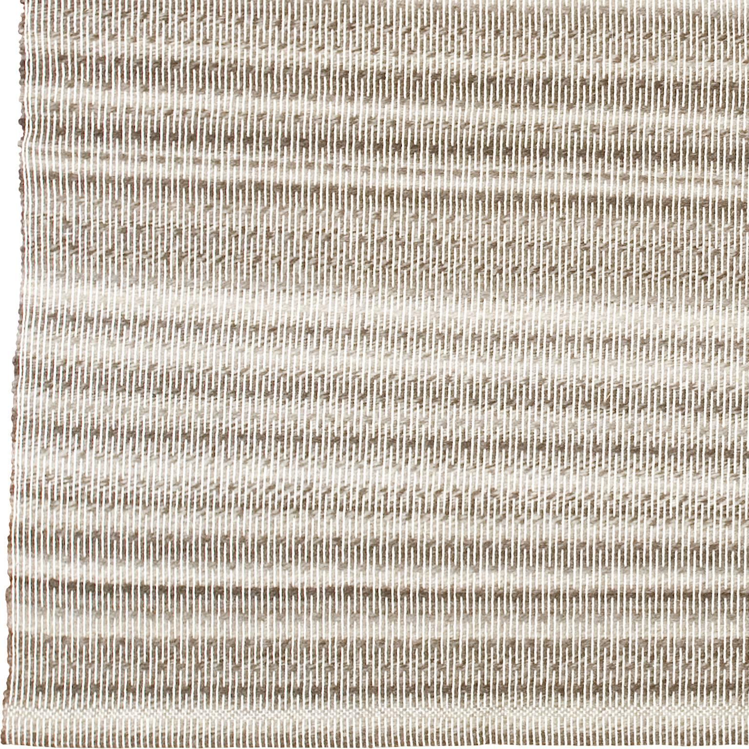 Tappeto sardo contemporaneo 'IF-106'. 
80% lana grigio melange e 20% cotone.
tessuto a mano