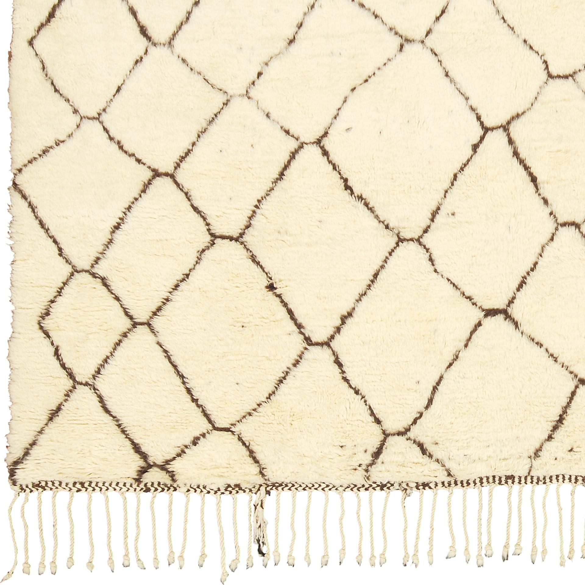 Beni Ourain carpet, Morocco. Originating from the Northeastern Azilal province of the Moroccan high Atlas region, this fascinatingly modern was instinctively woven by Berber tribes. Neutral shades vary from white to brown natural wool.