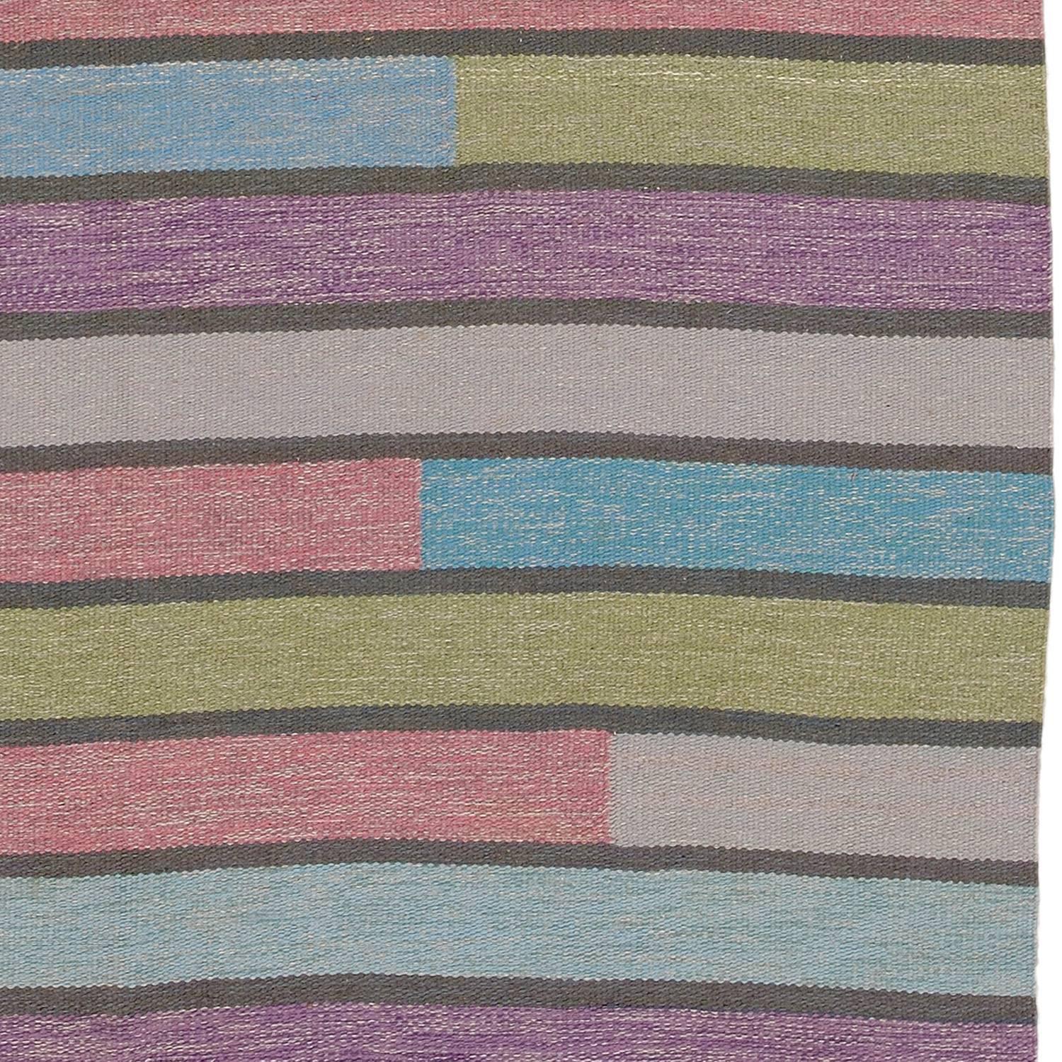 20th century Swedish flat-weave carpet with polychrome line pattern. 
Designed by Ingrid Hellman-Knafve.
Sweden ca.1950
Handwoven