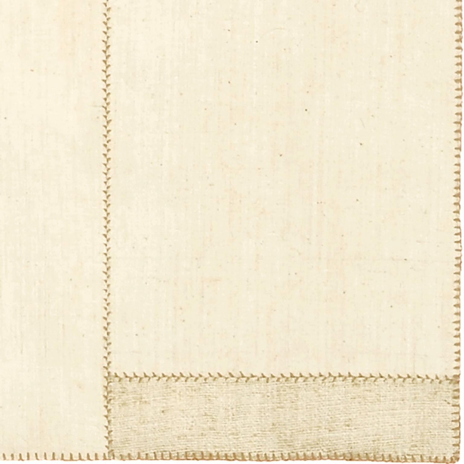 Vintage Kilim composition: Five white Turkish panels in composition with six pieces (stripes- camel color on white piece, coarse weave, hemp). 
Stitch: Regular Herringbone stitch between panels.
Edge: Button stitch around and dyed linen.
