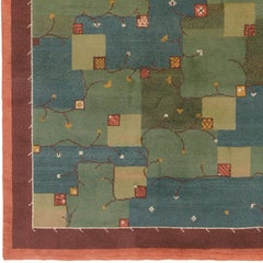 Early 20th Century Blue and Green Patchwork Style Swedish Pile Rug