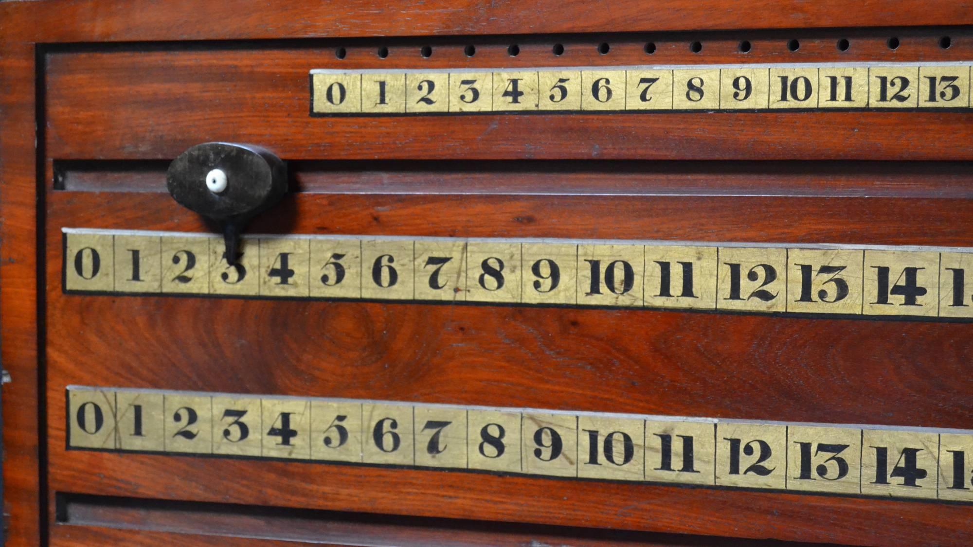 An exceptionally elegant wall-mounted mahogany framed Billiard marker by Gillow’s of London & Lancaster, circa 1820.

Beautifully constructed of the finest mahogany with gilded lettering and ebony inlay this scorer is one of the earliest we