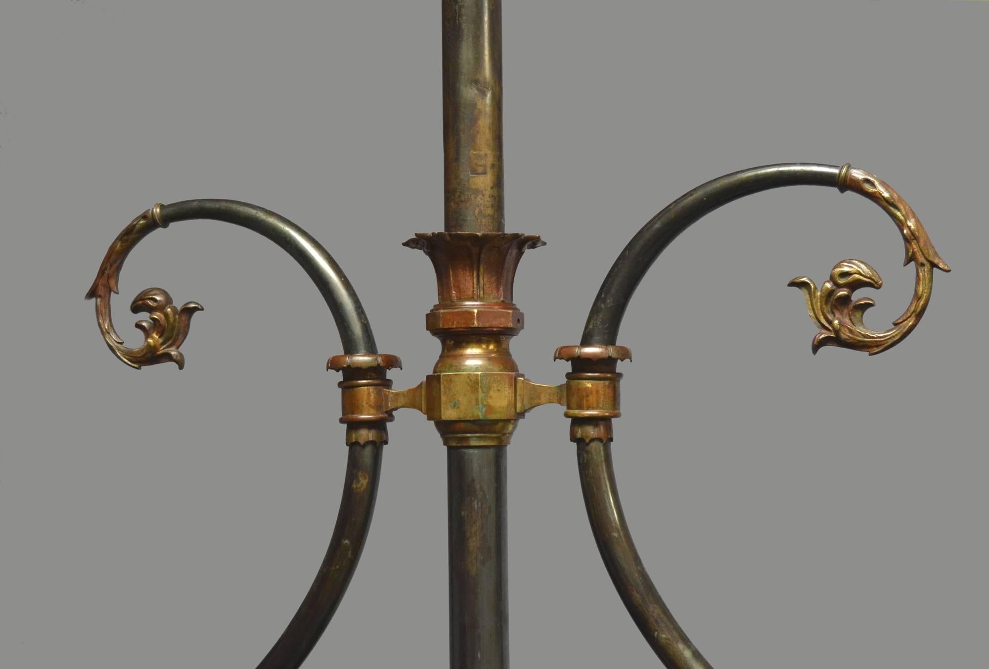 A fantastic brass framed billiard light with foliate castings, a central coronet and tapering braces complimented with decorative finials, the color and patina is exceptional, we have purposely kept the original aged look of this lamp as the various