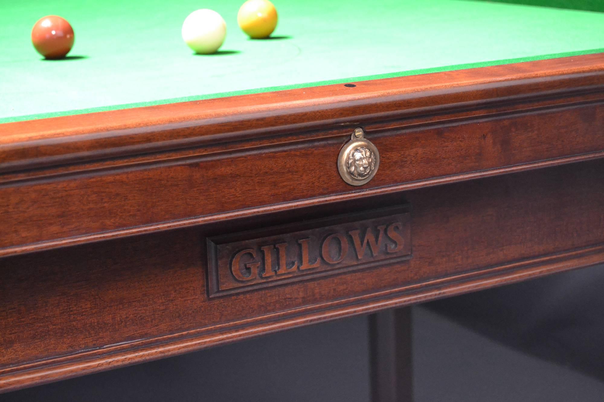 A rare 10ft x 5ft Billiard or Snooker table in the Gainsborough manner by Gillow's of Lancaster circa 1800, standing on eight elegant chamfered and shaped legs, with brass mounts fitted to the frame, legs and cushion friezes.
The simple but