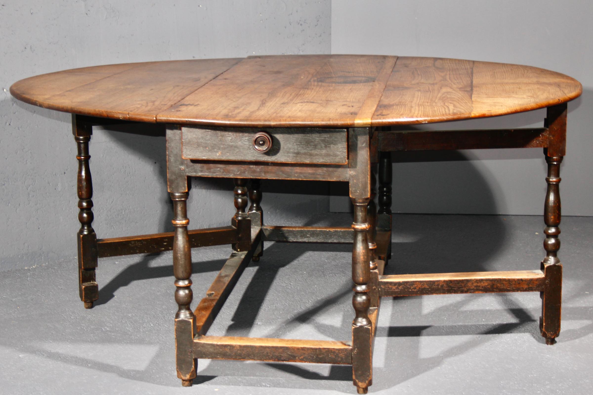 Oak oak table with one drawer and two folding extensions, beautiful patina For Sale
