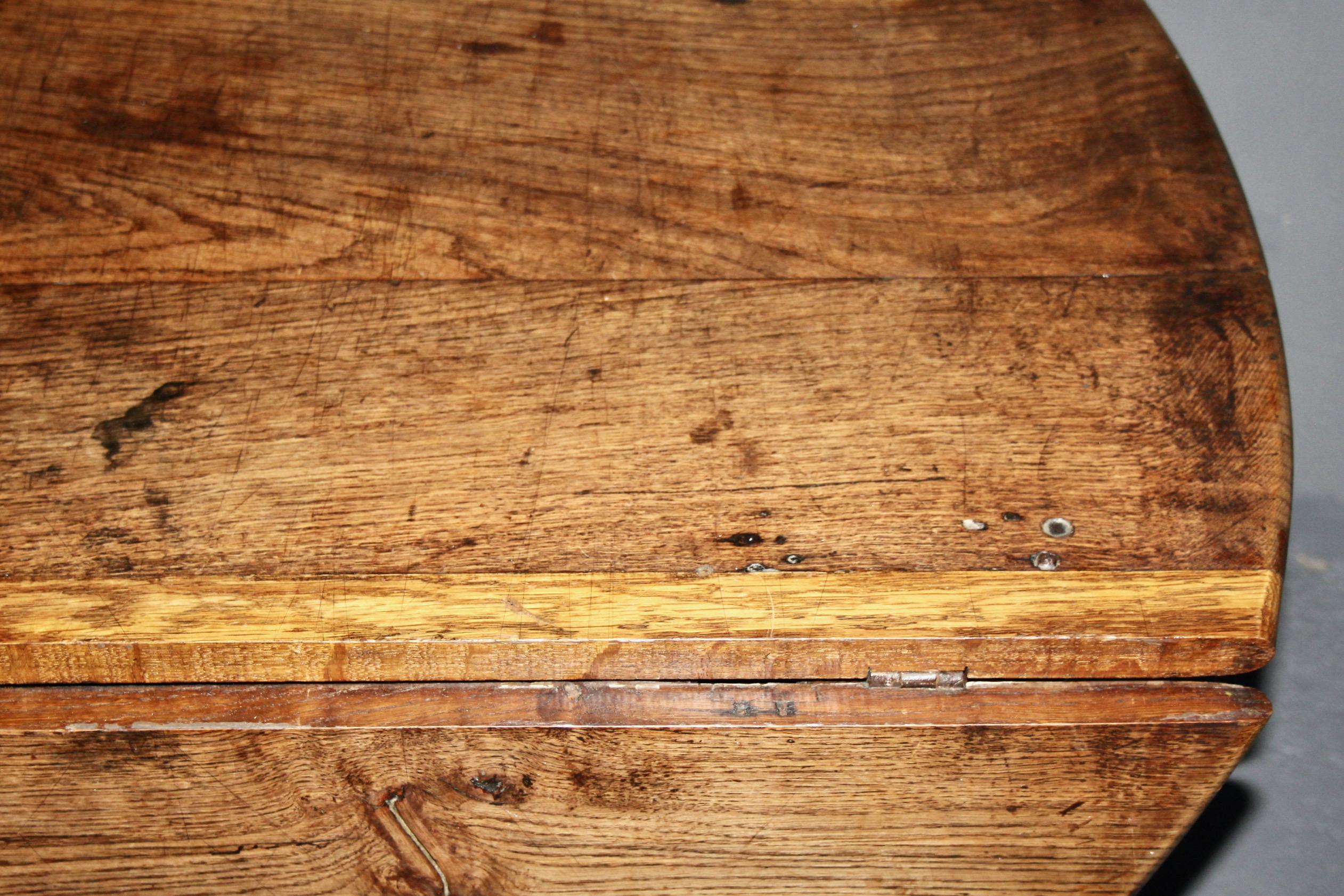 oak table with one drawer and two folding extensions, beautiful patina For Sale 1