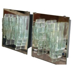 Pair of Raak sconces with metal and glass