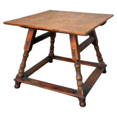 Alpine table, also known as Old Swiss table. It is square, made of fir wood
