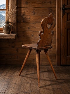Alpine *escabelle* chair; restored in two places
