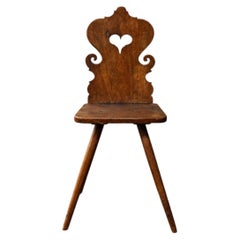 Alpine *escabelle* chair; restored in two places