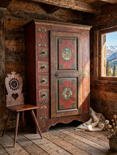 Swiss Alpine wardrobe consisting of a row of drawers and a storage door