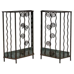 Pair of wrought iron Art Deco umbrella stand in the manner of Edgar Brandt