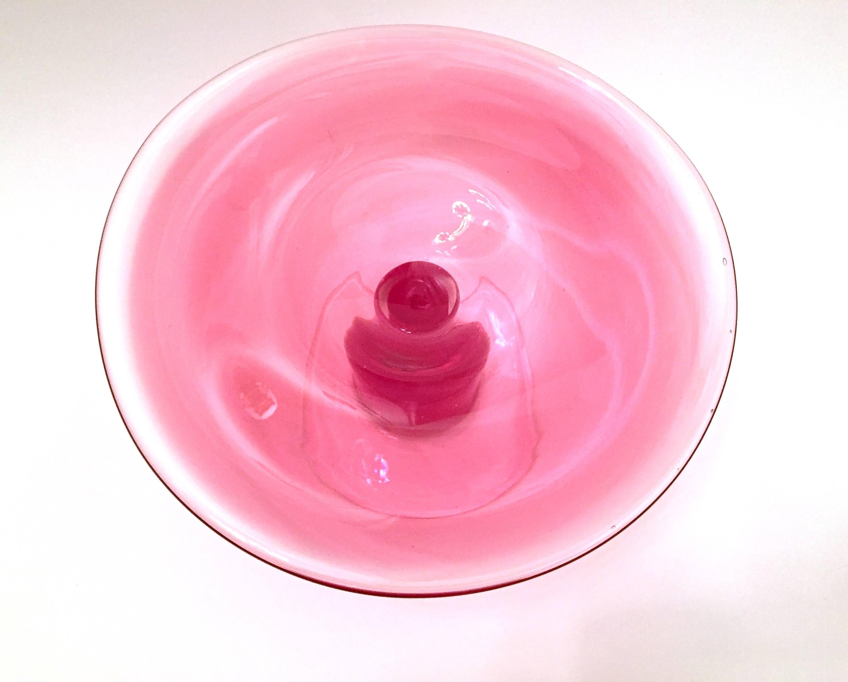 A handmade cake plateau in light pink and fiery red glass by Erik Höglund (1932-1998) for Chribska Sweden. Signed and dated 1992.