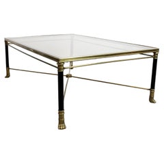 Coffee table in gilt bronze and black lacquered metal with a glass top - France