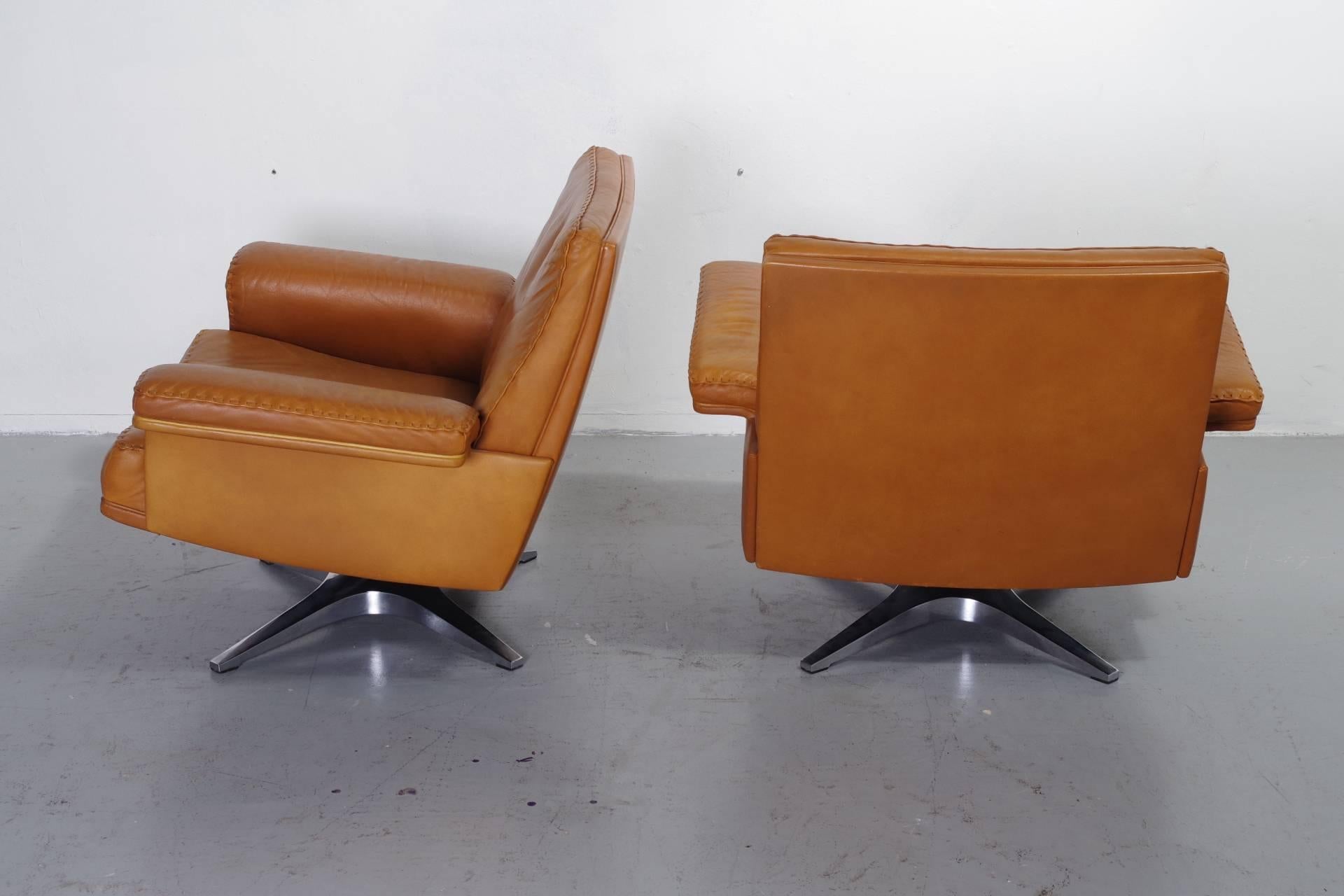 Exceptional  lowback De Sede DS31 in cognac leather and in perfect condition. The leather is in the original condition and feels like real life can be; soft and firm, on demand we can offer a treatment with aniline (transparent) to extend the life