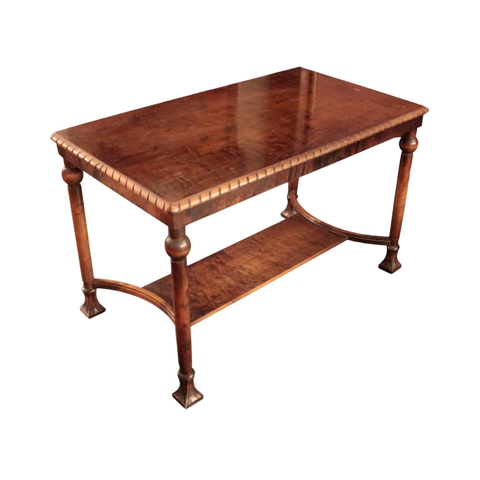Full professional restoration is included in the price, please allow 2 weeks. 

Elegant tall cocktail table featuring rectangular top with dentil edge molding raised on four colonette legs with sphere capitals and channelled plinth feet joined by