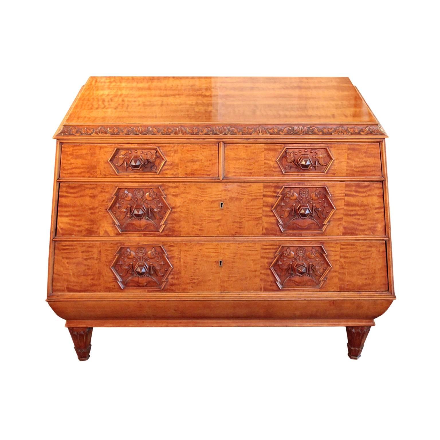 Highly unique German early 20th century chest of drawers, most likely sui generis. Featuring a lyre form cabinet with carved edge and four drawers with pair of smaller drawers in top row. Each drawer fitted with hexagonal pull central to exquisitely