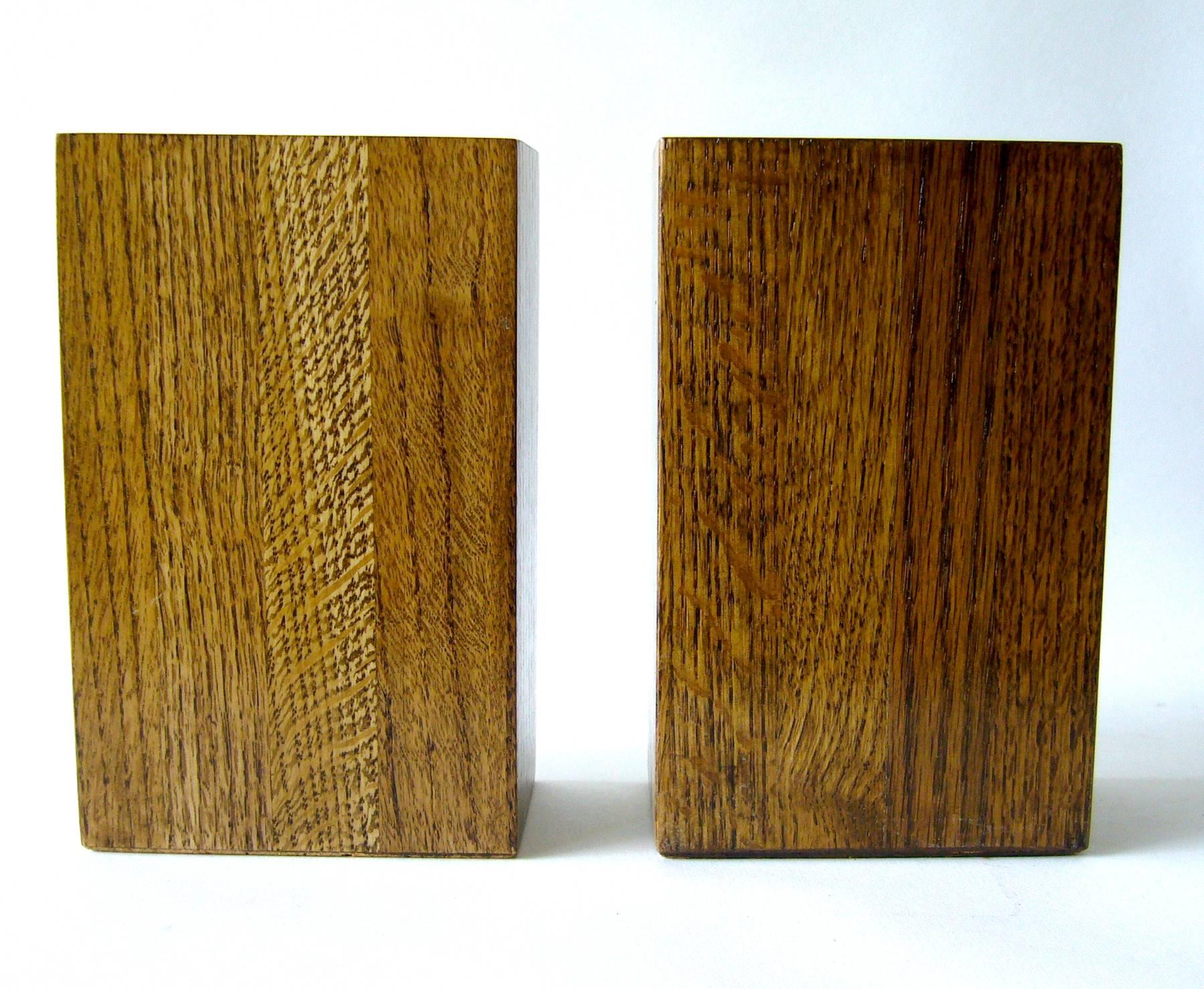 Enamel and wood bookends with cork bottoms created by Anne Marie Davidson of Sierra Madre, California. Bookends measure 7.25