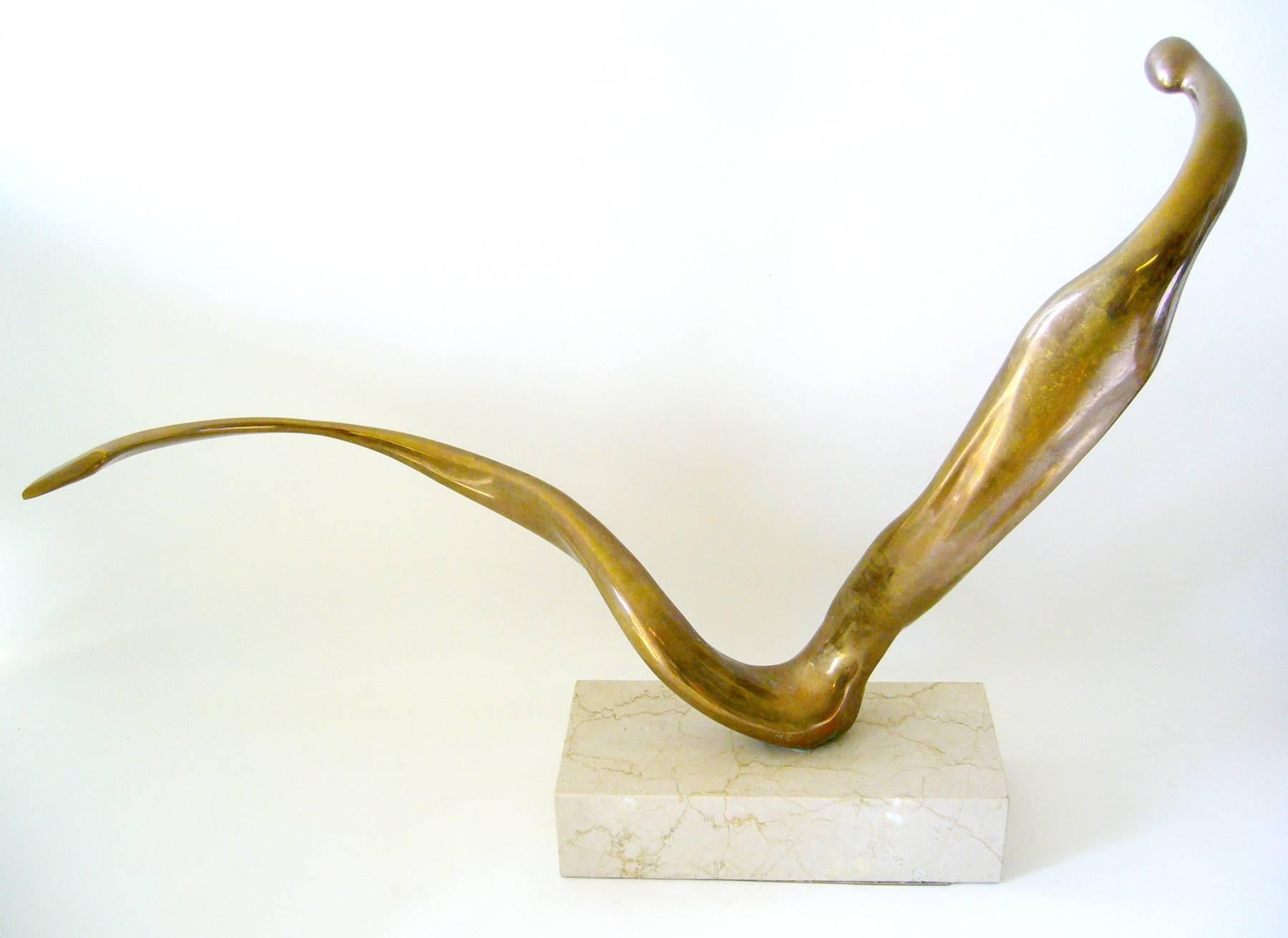 Elongated, abstract figural bronze on marble base created by Cuban listed artist, Manuel Carbonell. Sculpture measures 23