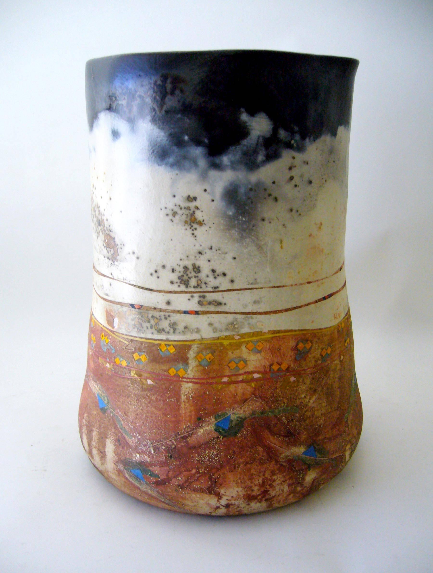 Large earthenware ceramic open vessel created by Bennett Bean of Blairstown, New Jersey. Piece has a wonderful finish which includes hand painted areas along with smokey, black areas created by the pit firing. A natural crack, occurring in the