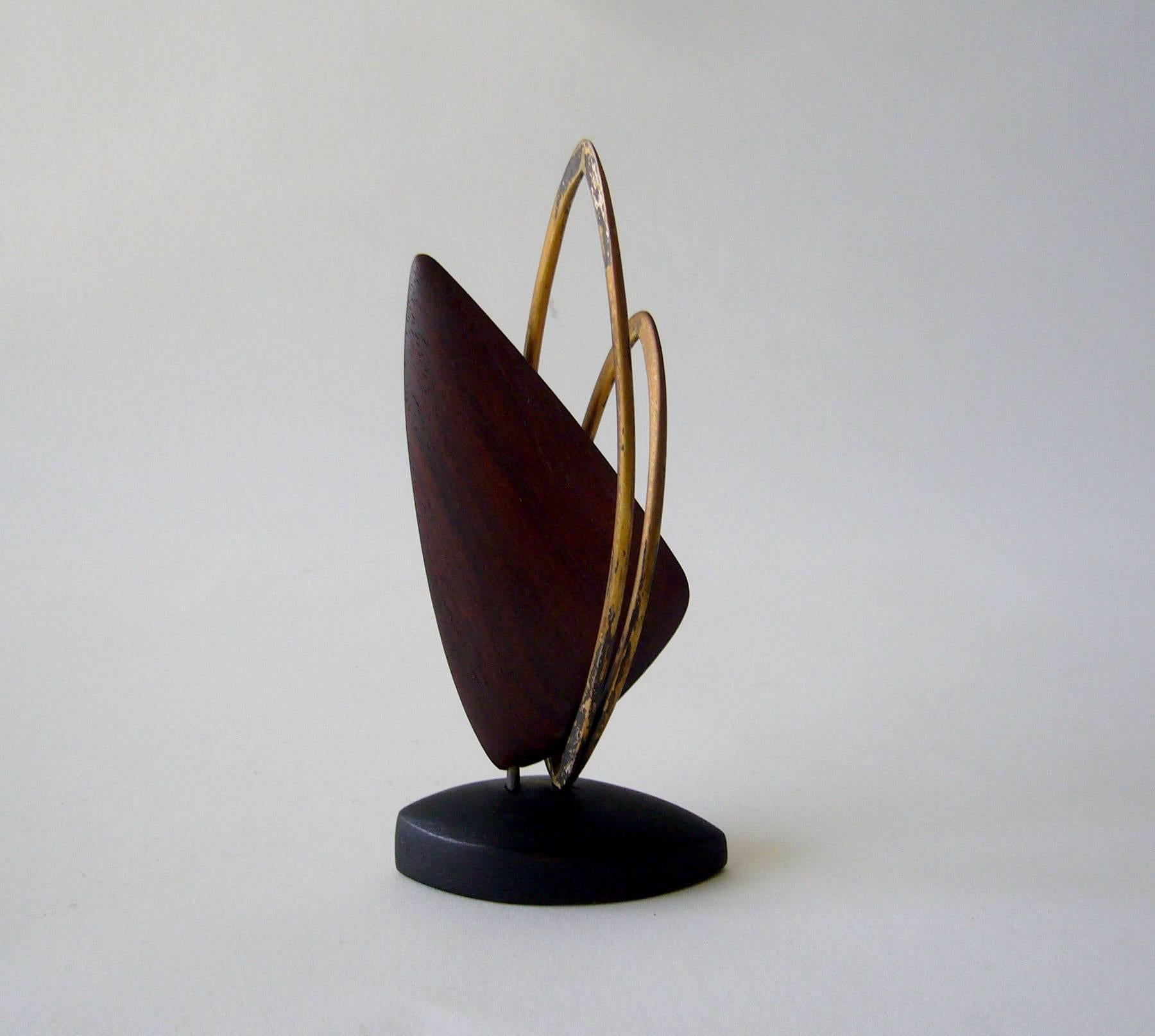 Handmade copper sculpture on wood base created by Jack Nutting of San Francisco, California. Sculpture stands 5.75