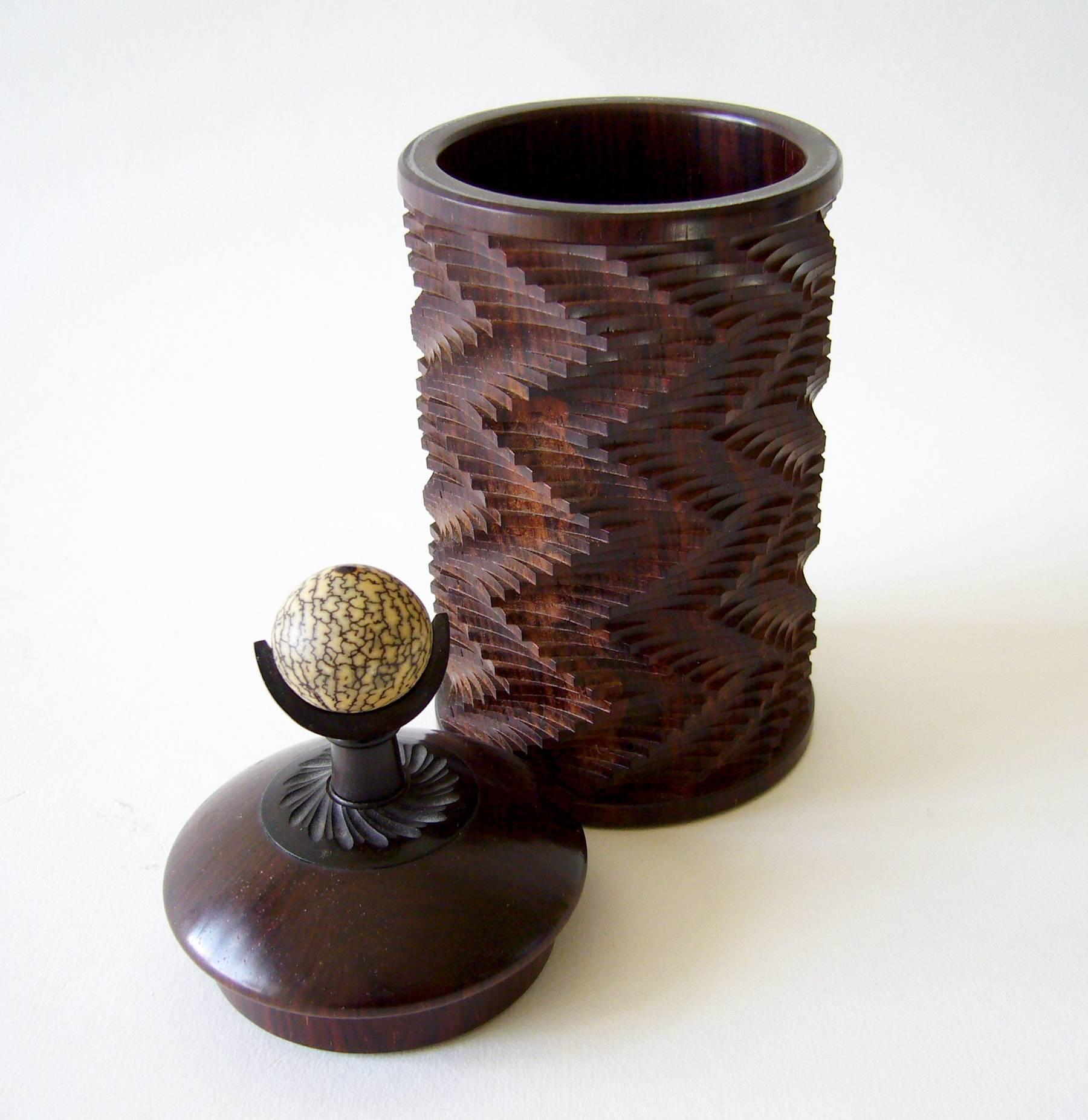Zig zag patterned cocobolo, blackwood and betel nut lidded box created by Jon Sauer of San Francisco, California. Box measures 7