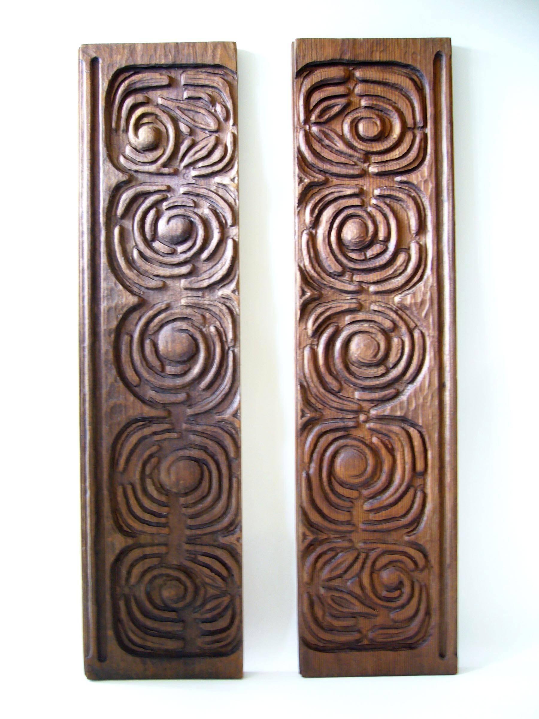 Hand-carved redwood decorative panels designed by Evelyn Ackerman for Panelcarve. The following is taken from the Ackerman Modern website:

Evelyn created a series of carved wood designs for architectural applications that became the basis for