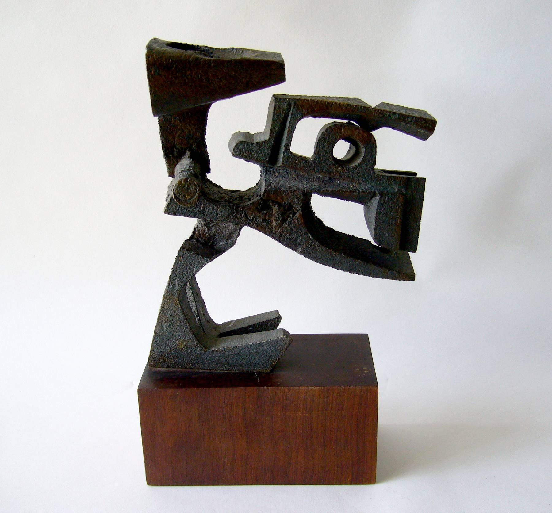 Bronze sculpture on wood base created by Italian born architect and sculptor Paolo Soleri of Arizona. Sculpture has an overall measurement of 15