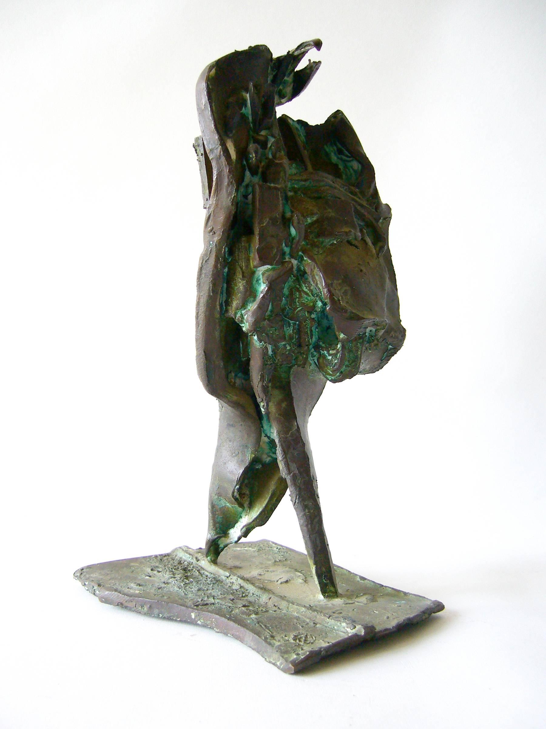 Bronze abstract figural sculpture created by sculptor and jeweler Robert A. Dhaemers of Oakland, California. 
Dhaemers exhibited at the National Gallery of Canada in Ottowa, the Oakland Museum of California, the Elaine Benson Gallery in