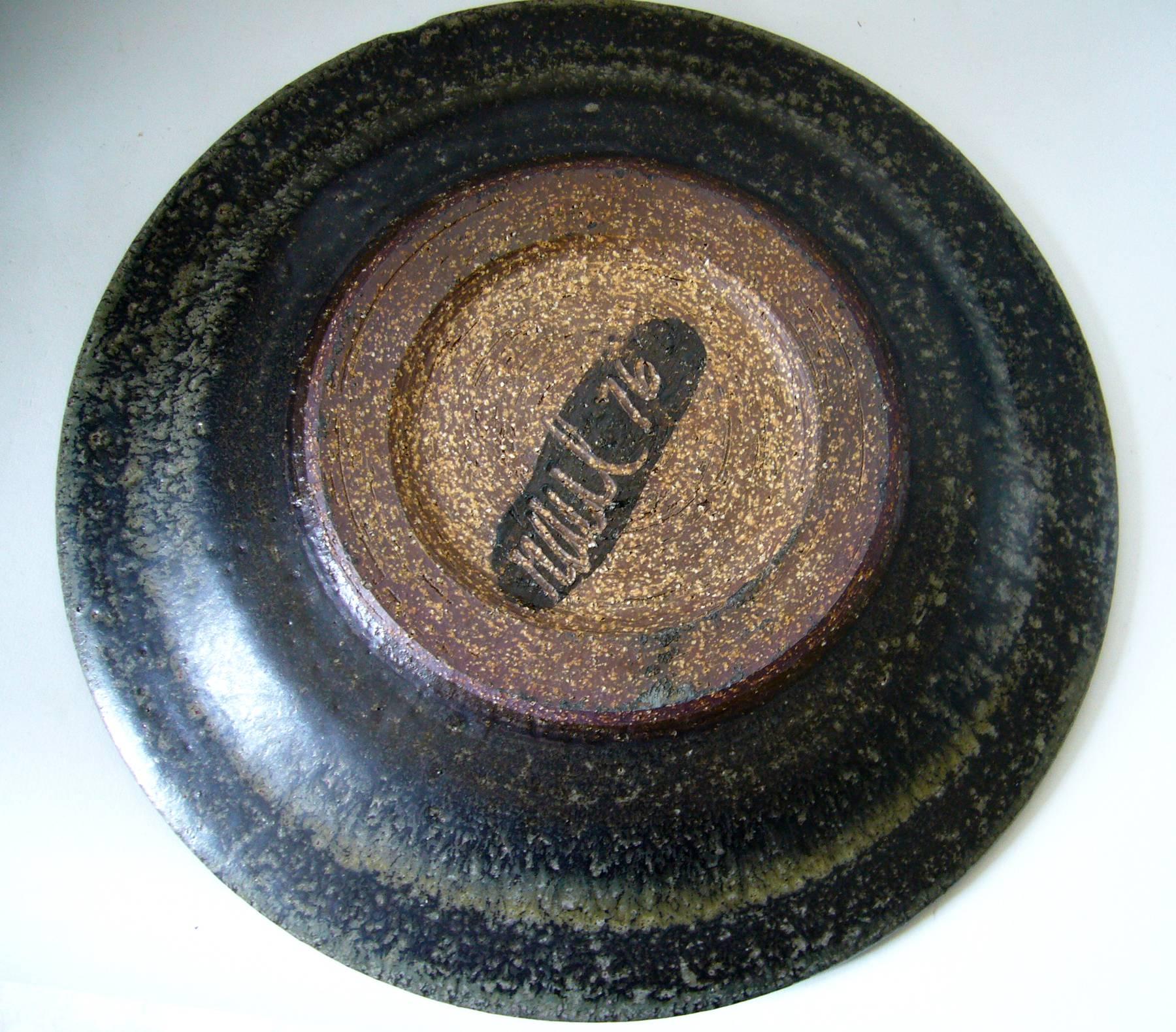 California studio stoneware charger or platter created by Raul Coronel of Los Angeles, California. Platter measures 12