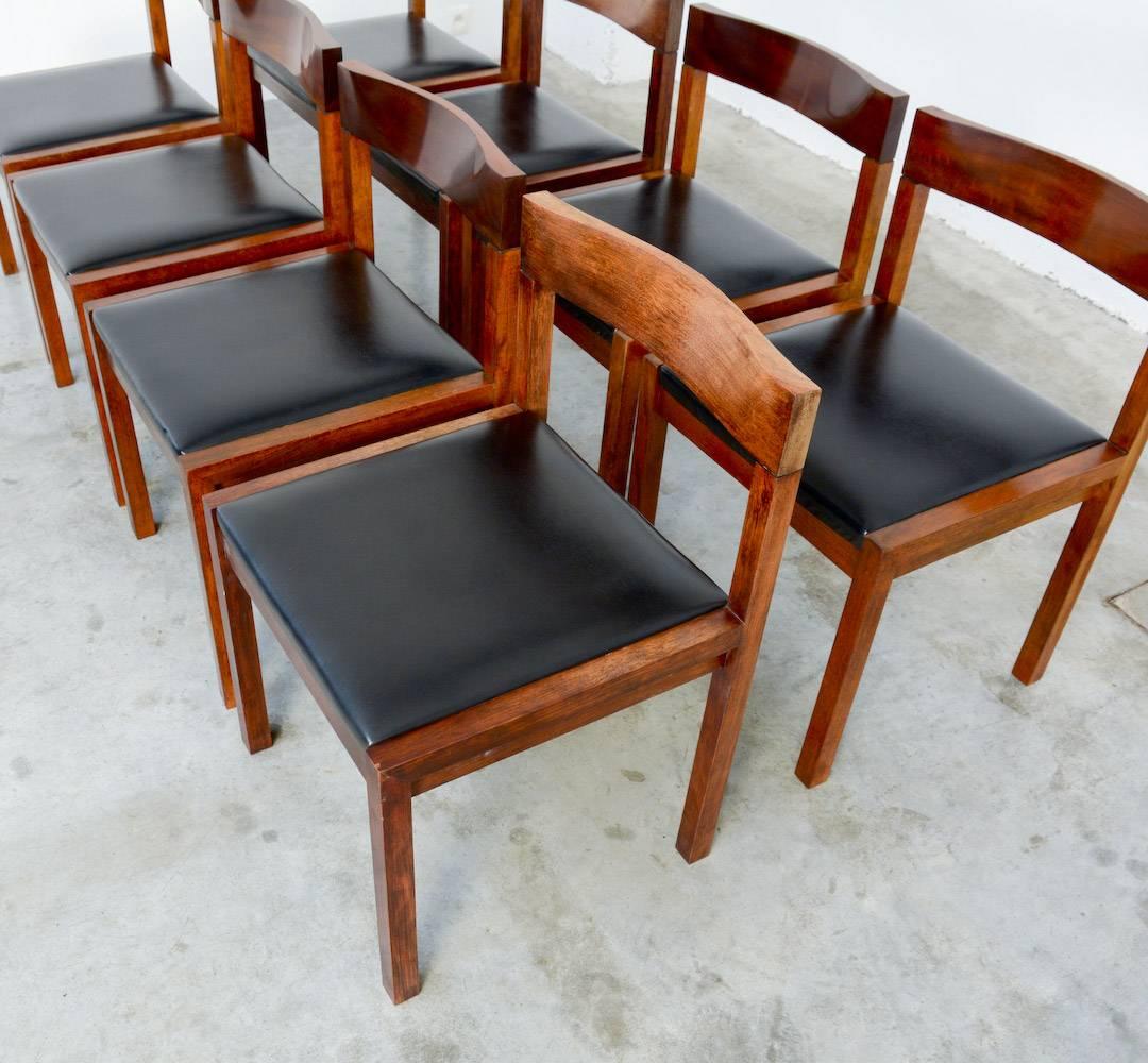 These robust geometric dining chairs are designed by Alfred Hendrickx in the late 1960s for Belform.
The solid frame in rosewood holds the black skai seat.
These pure chairs are perfect with the table we offer on our website.
The chairs are all