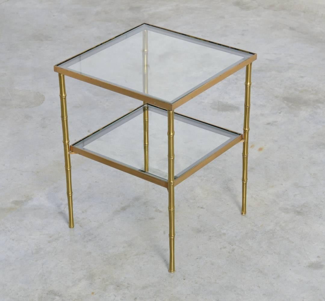 This two-tier side table can be attributed to Maison Jansen in Paris.
It is a stylish decorative piece of the 1970s in very good vintage condition.