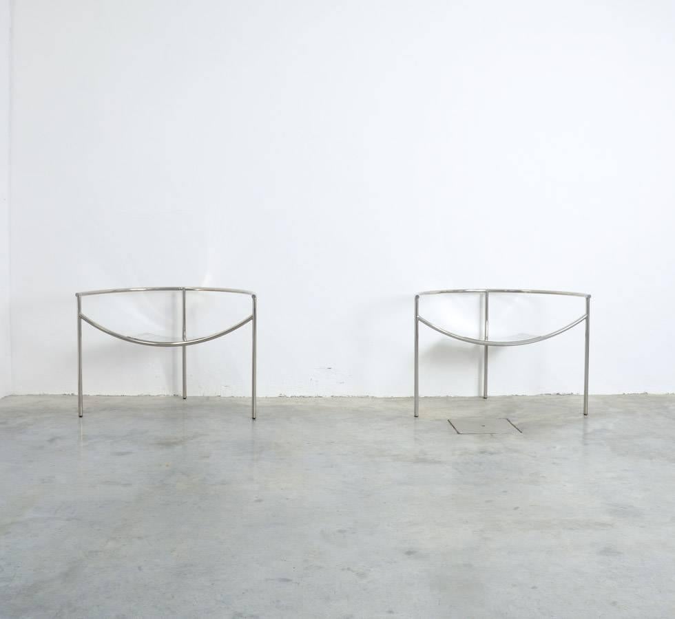 Philippe STARCK designed in 1983 this iconic three-legged armchair Doctor Sonderbar for XO.
The seat is made of chromed perforated sheet steel matching with the chromed tubular steel frame. The chairs are marked XO.
Both chairs are in perfect
