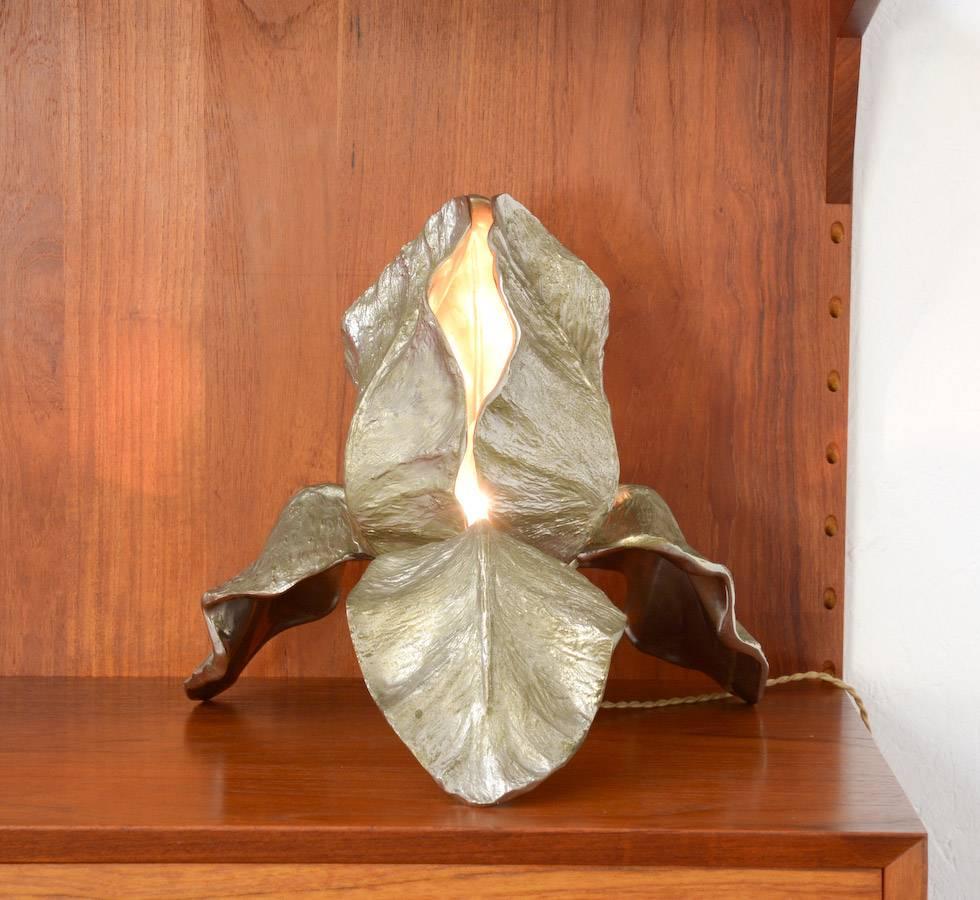 This exclusive table lamp Iris was designed by Christiane Charles and made in the workshop of Maison Charles in Paris.
This bronze sculptural Iris lamp was finished with nickel.
This old original lamp is still in perfect vintage condition and