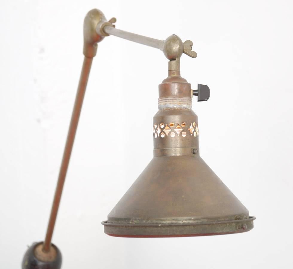 This old Industrial desk lamp is unique with its unusual internally mirrored shade in white and blue.
This desk-mounted version is produced by hand and sophisticated made in the 1920s.
Take a look at the detail pictures and you will be impressed