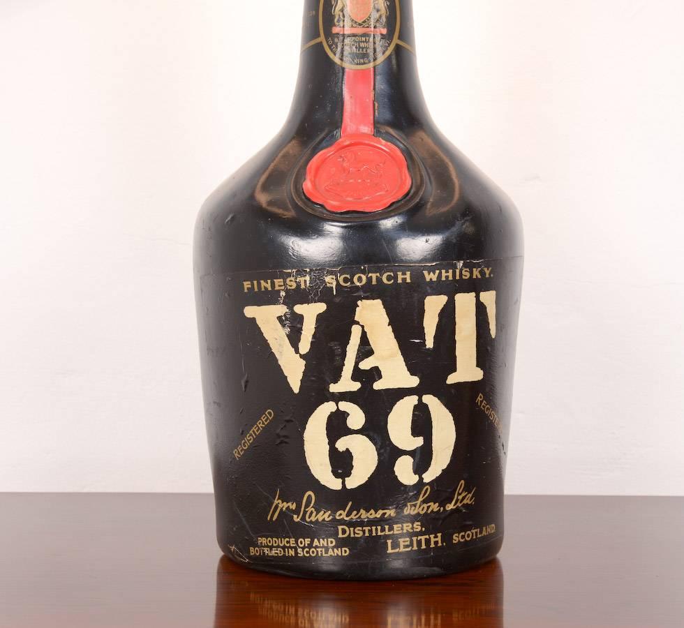 This wonderful VAT 69 old store display bottle has been converted into a lamp. It’s great to create a special effect in your interior.
The lamp is in very good condition, with the original commercial seal, it’s rewired and it has a new shade.
